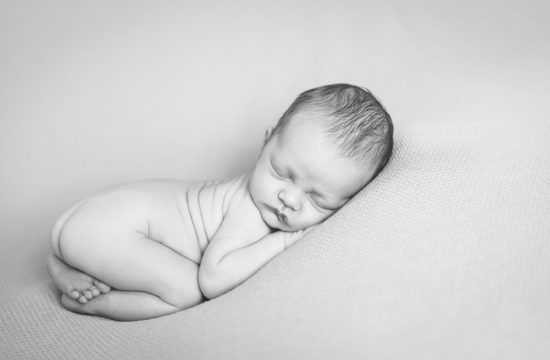black and white photo of newborn baby boy