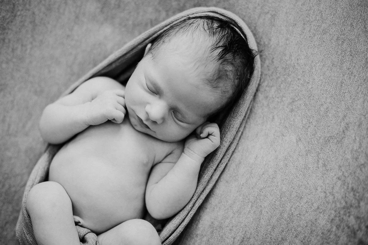 newborn posed baby boy photography session