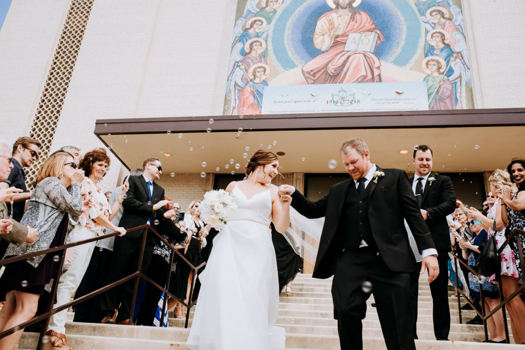 bride and groom exiting church