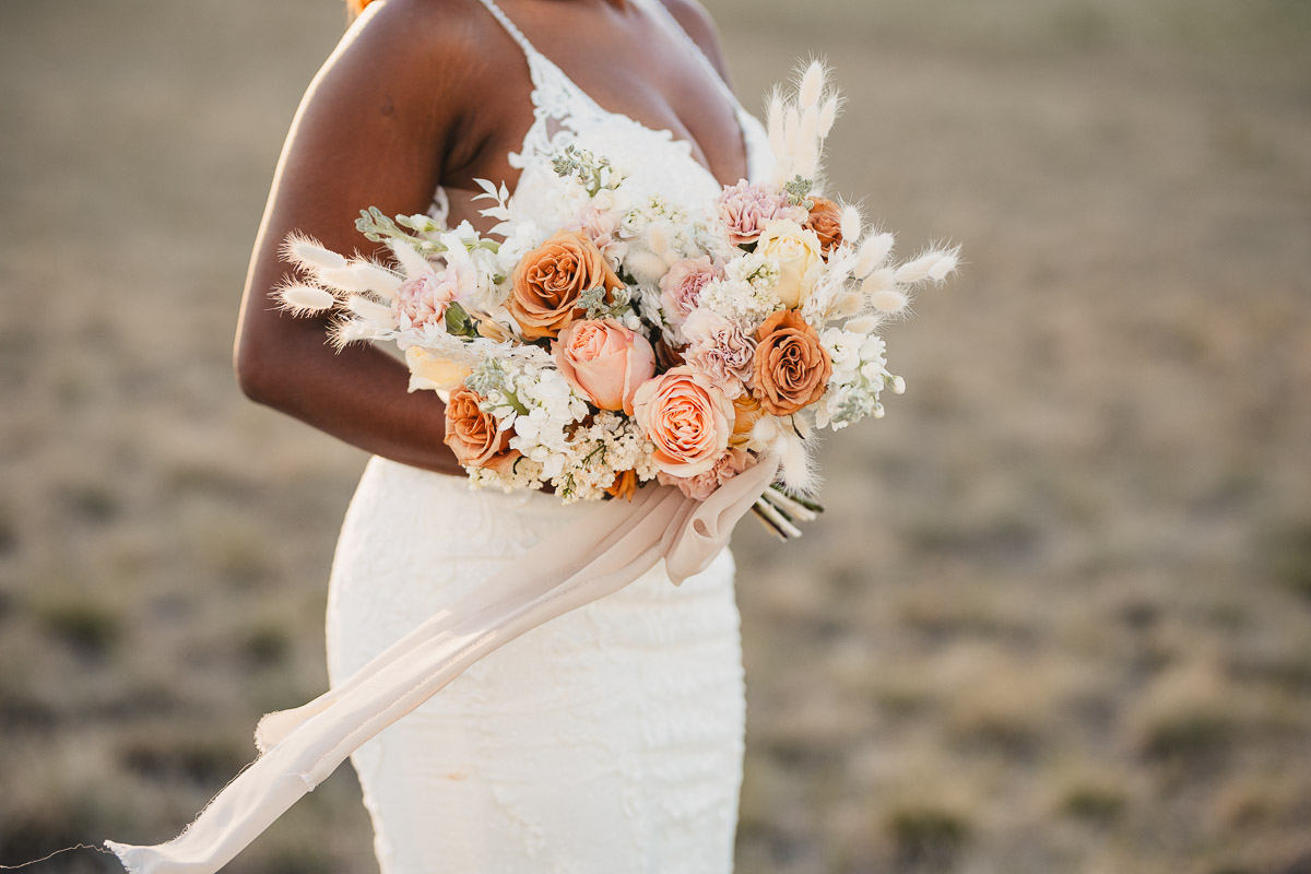 bride in Birds Hill Park with bouquet